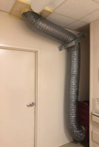 Figure 2: Portable air handler inside anteroom to create negative pressure.